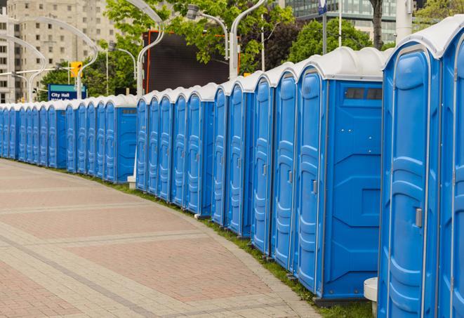 a line of spacious and well-maintained portable restrooms in Bell Gardens, CA